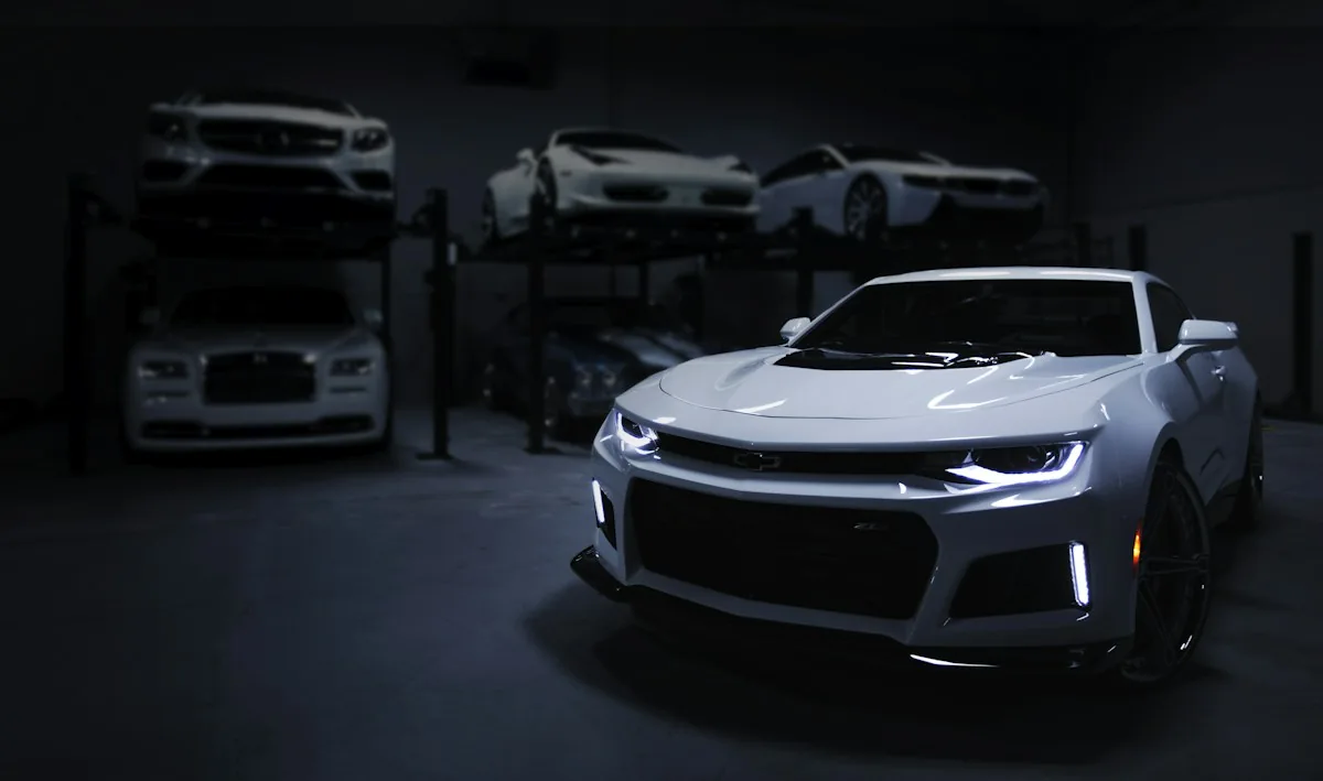 Silver sports car parked indoors